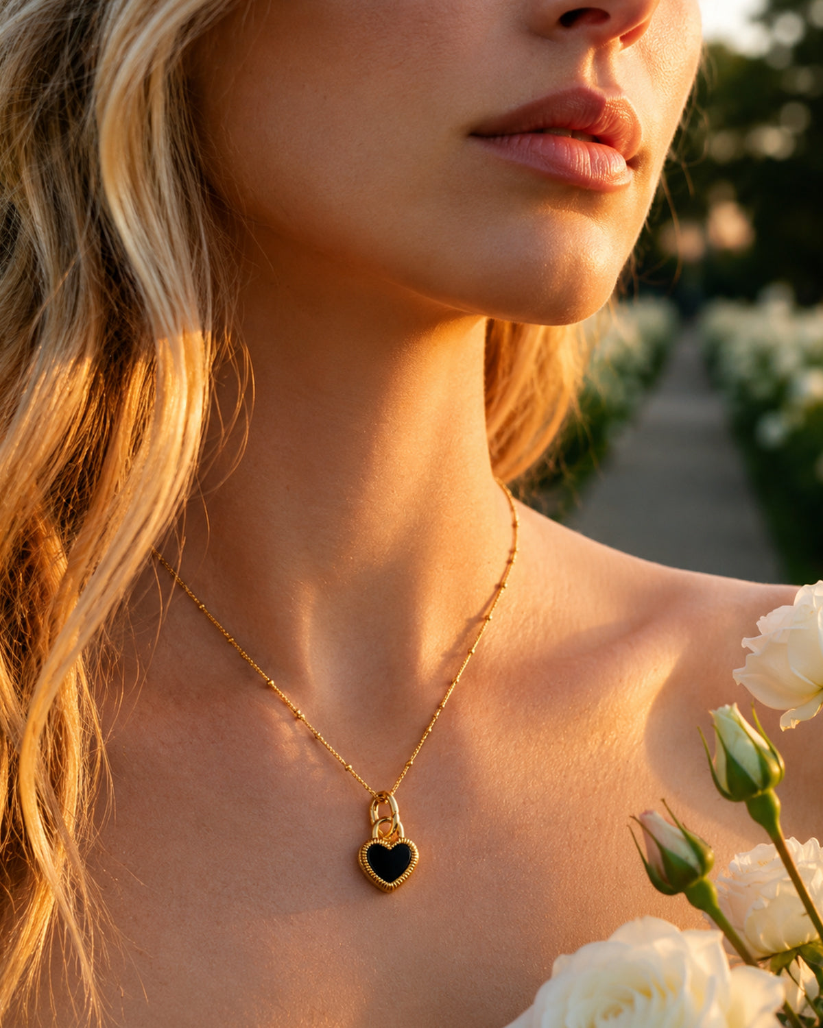 Gold Black Heart Pendant Necklace